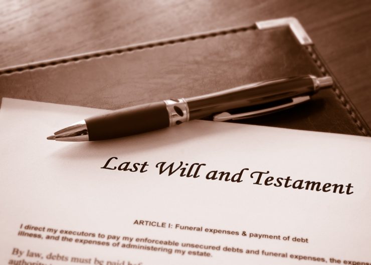 Last will and testament paperwork close up photograph with pen on top